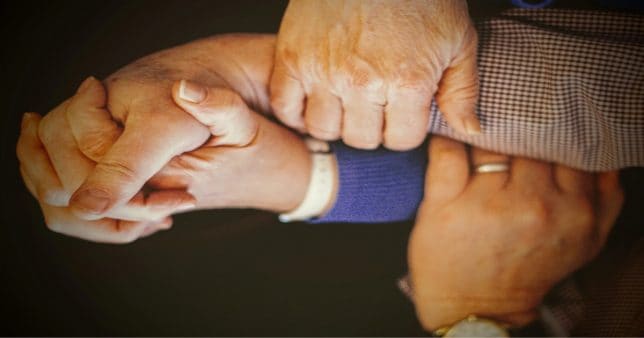 image-of-a-family-holding-hands-representing-a-hindu-undivided-family
