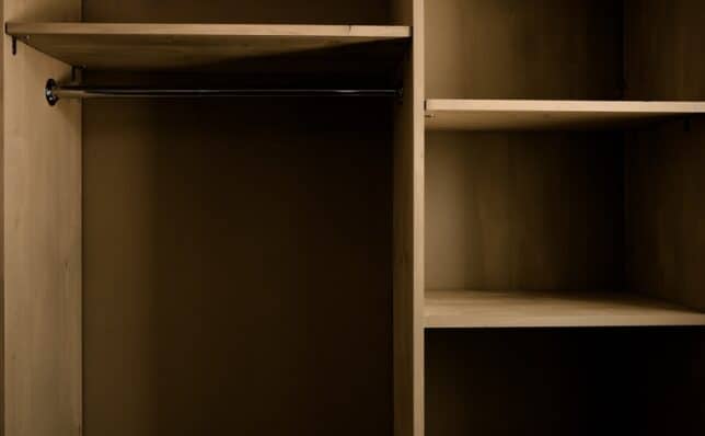 Empty wardrobe to represent the investment portfolio of a young earner